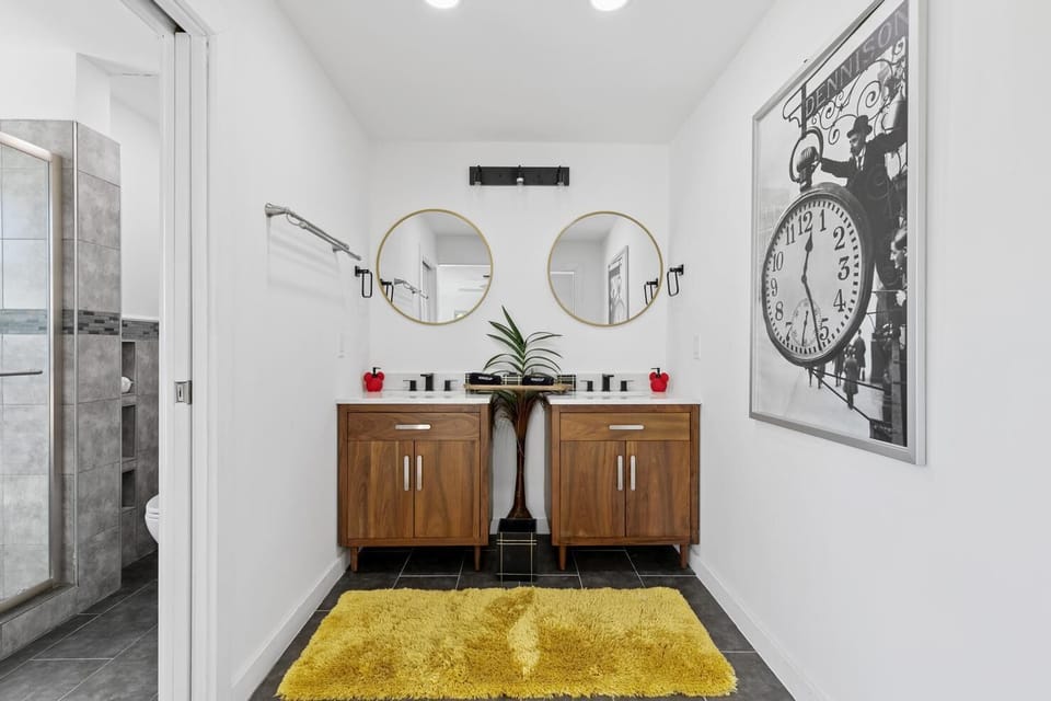 2nd Floor Master en-suite bath with 2 vanities and private shower & bath area.
