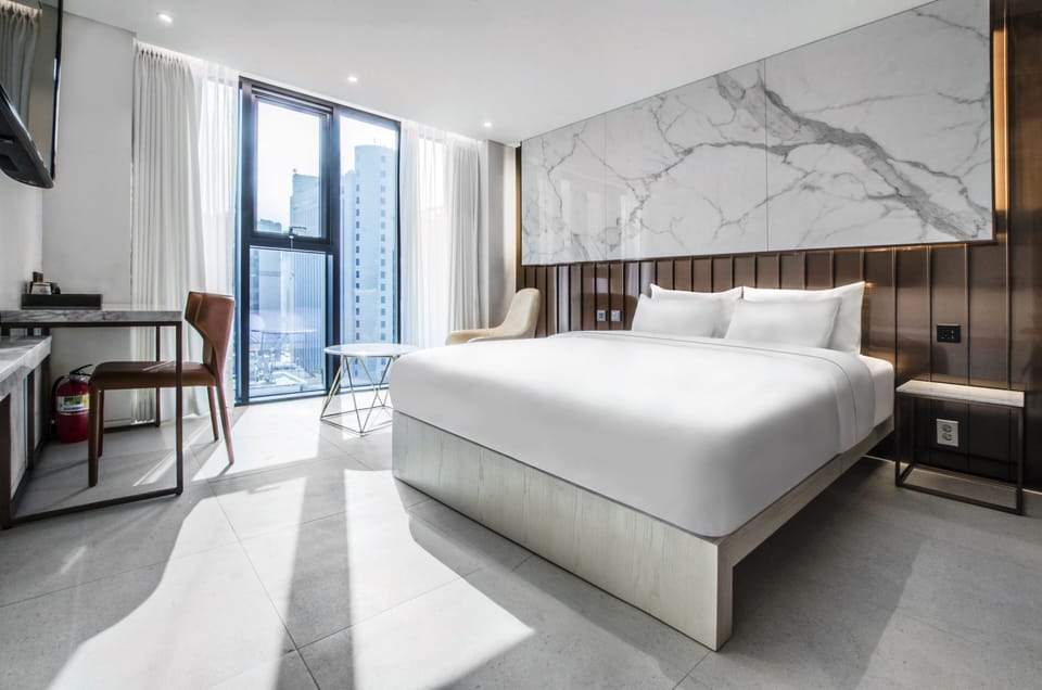 Deluxe Double Room (No Parking) | Down comforters, individually decorated, laptop workspace, soundproofing