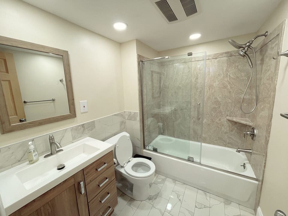 Full bathroom with bathtub
