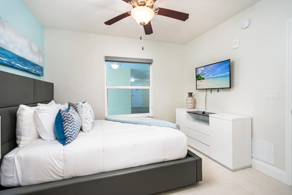 Queen Bed and TV
