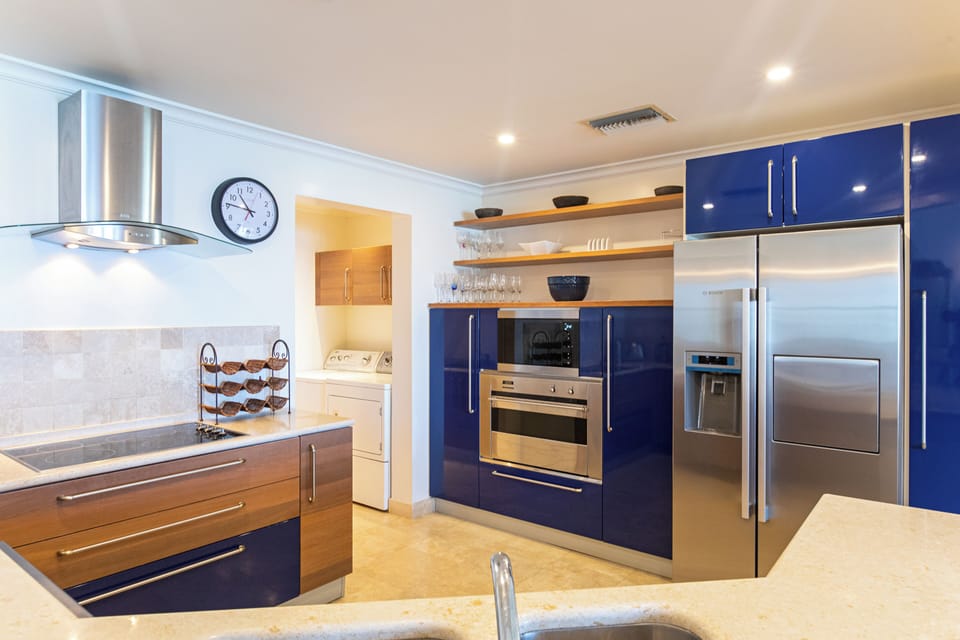 Condo, 2 Bedrooms | Private kitchen | Oven, electric kettle, toaster, cookware/dishes/utensils