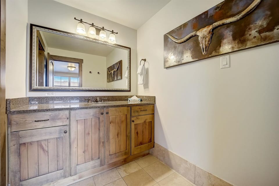 Ensuite bathroom with perfect powder area to get ready.