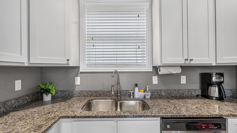 The kitchen is fully stocked with everything you'll need to cook.