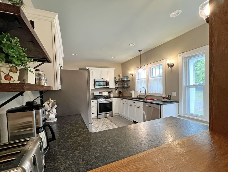 Fully Equipped Kitchen with Granite Counters & Stainless Appliances