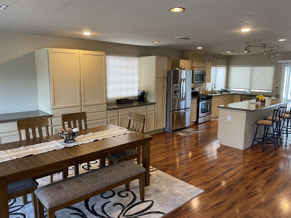 Dining room and kitchen, looking to the left from front door