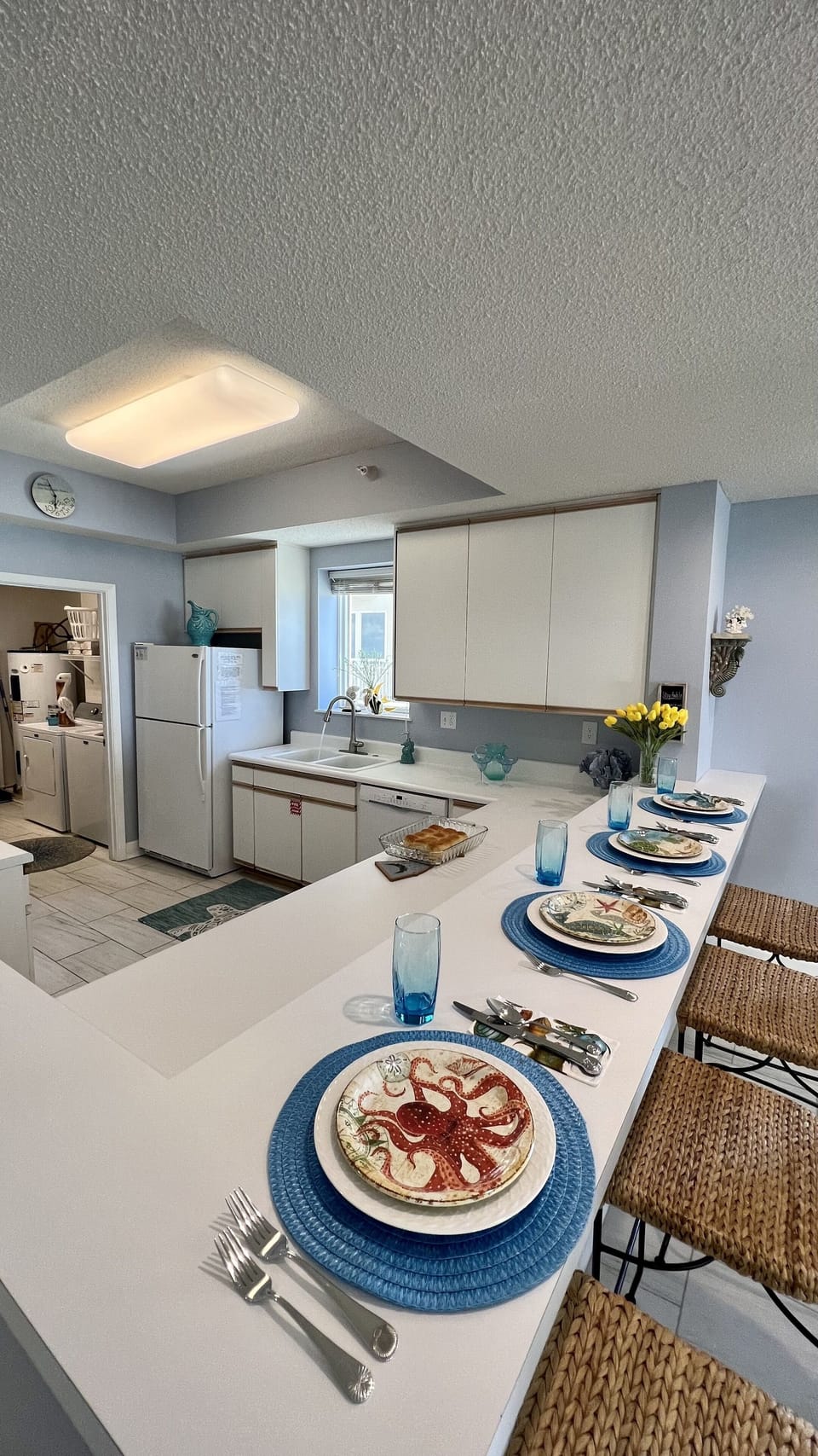 View of Kitchen. The Bar Seats 4. The Dining Room Table Seats 6.