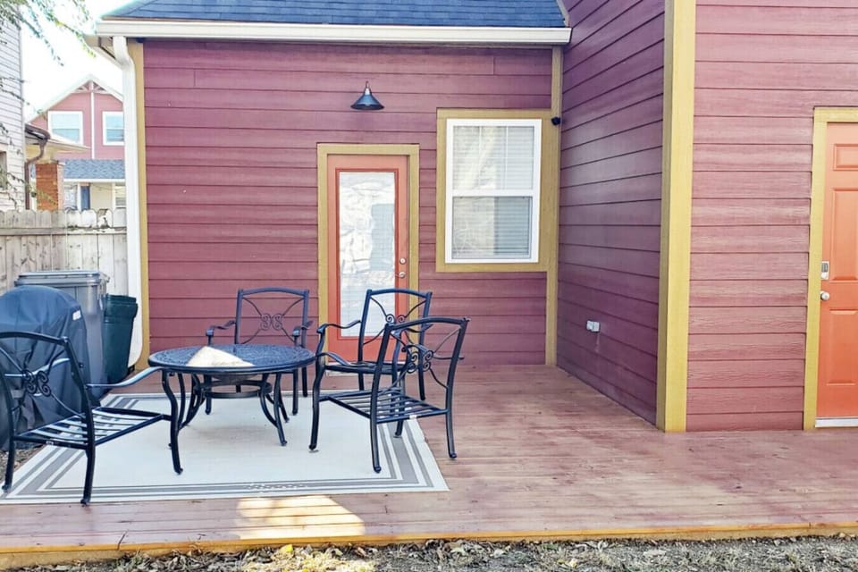 Rear outdoor seating area. firepit (grill no longer on site)