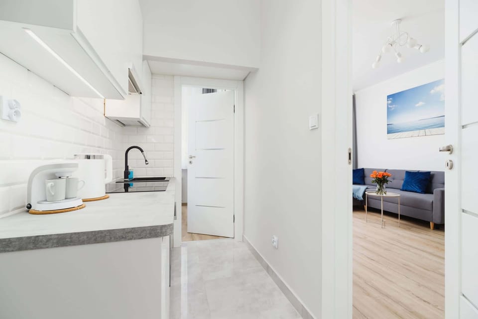 Functional kitchen space offers the possibility of preparing home-cooked meals.