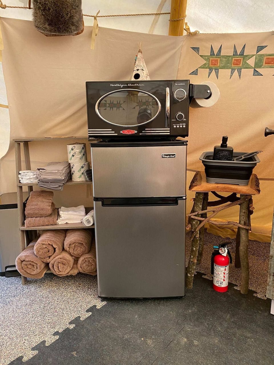 Mini fridge, microwave and storage.