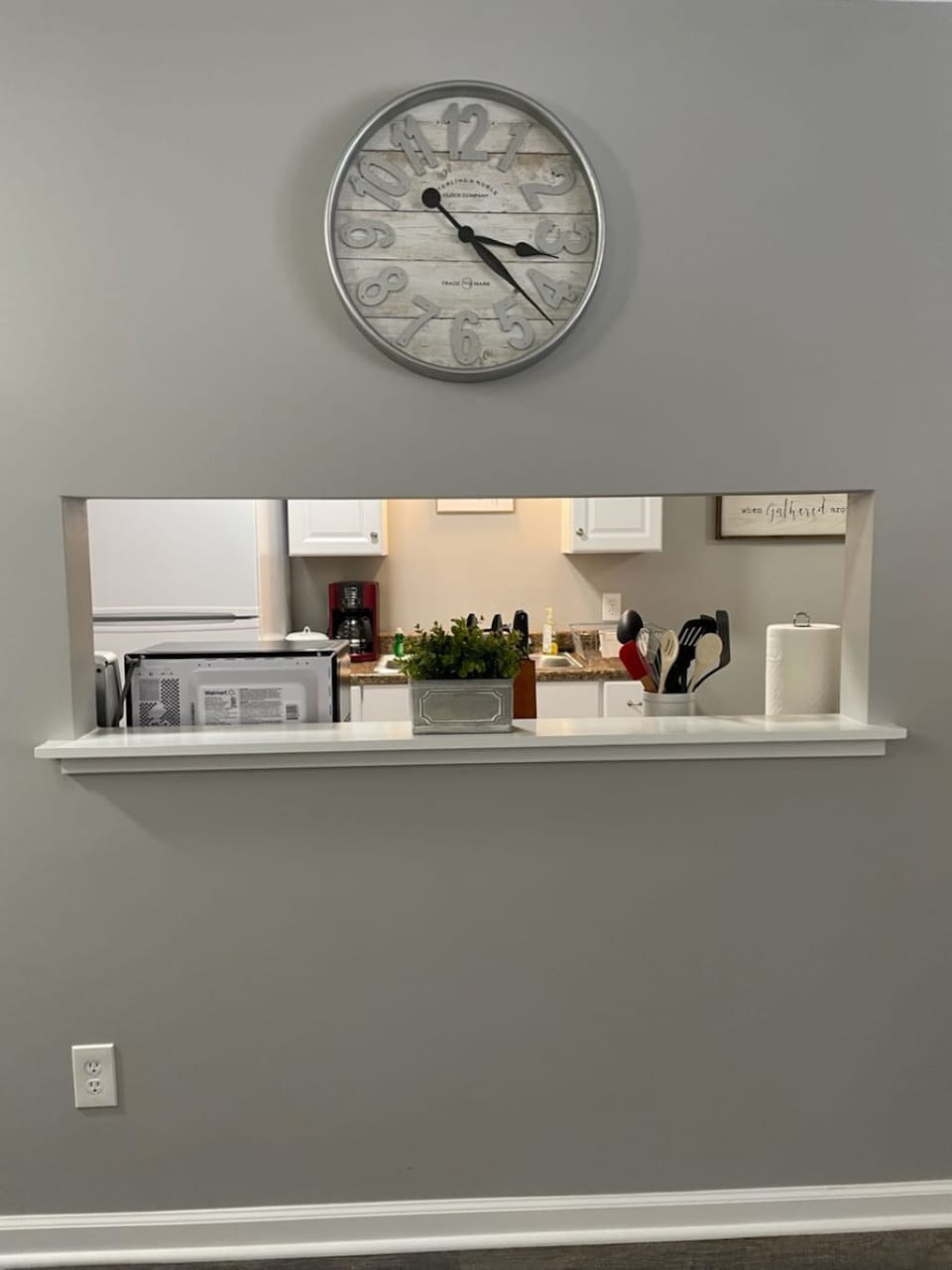 Window from living room to kitchen.