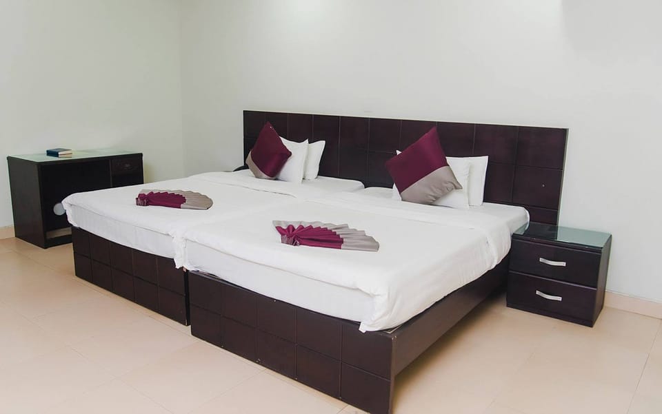 Desk, laptop workspace, WiFi (free), bed sheets