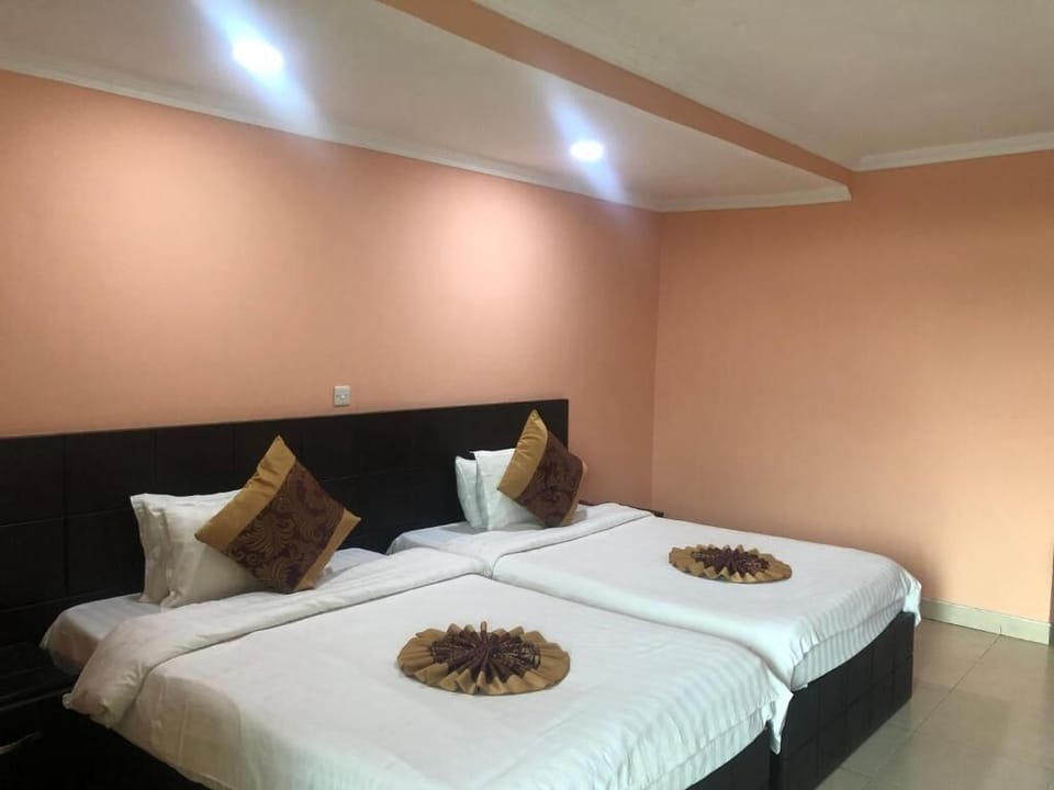 Executive Twin Room, 2 Bedrooms, Non Smoking, City View | Desk, laptop workspace, WiFi (free), bed sheets