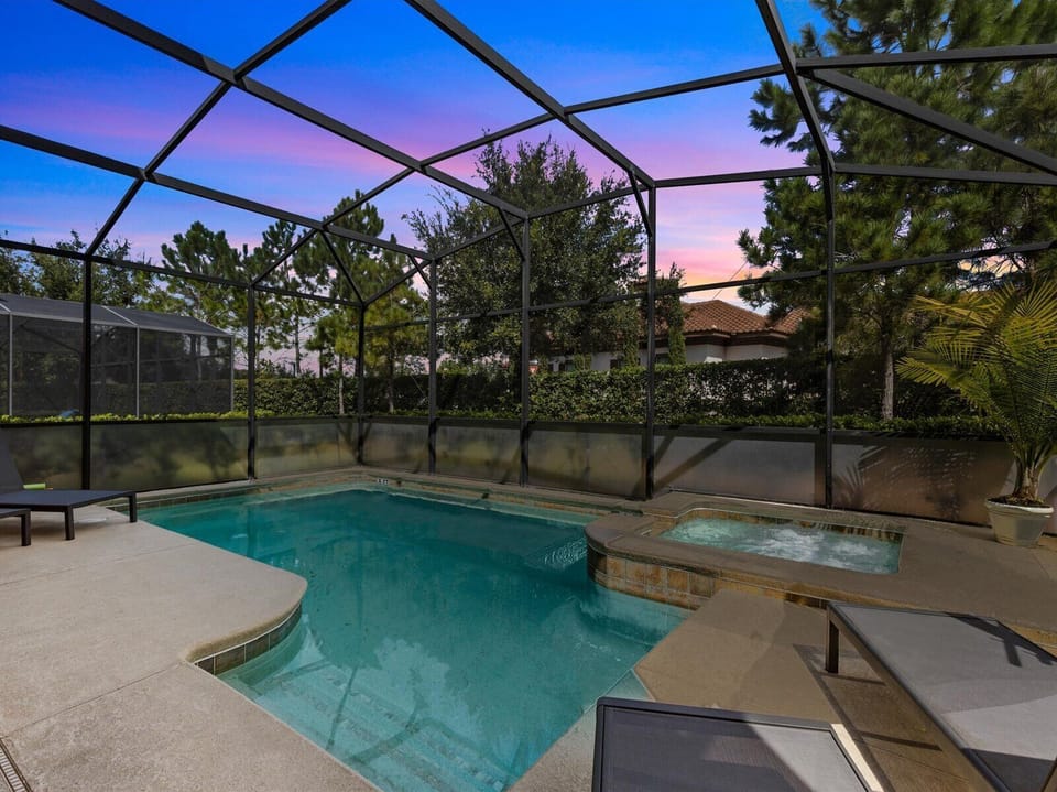 Pool at twilight. Pool lights can be activated for a night swim