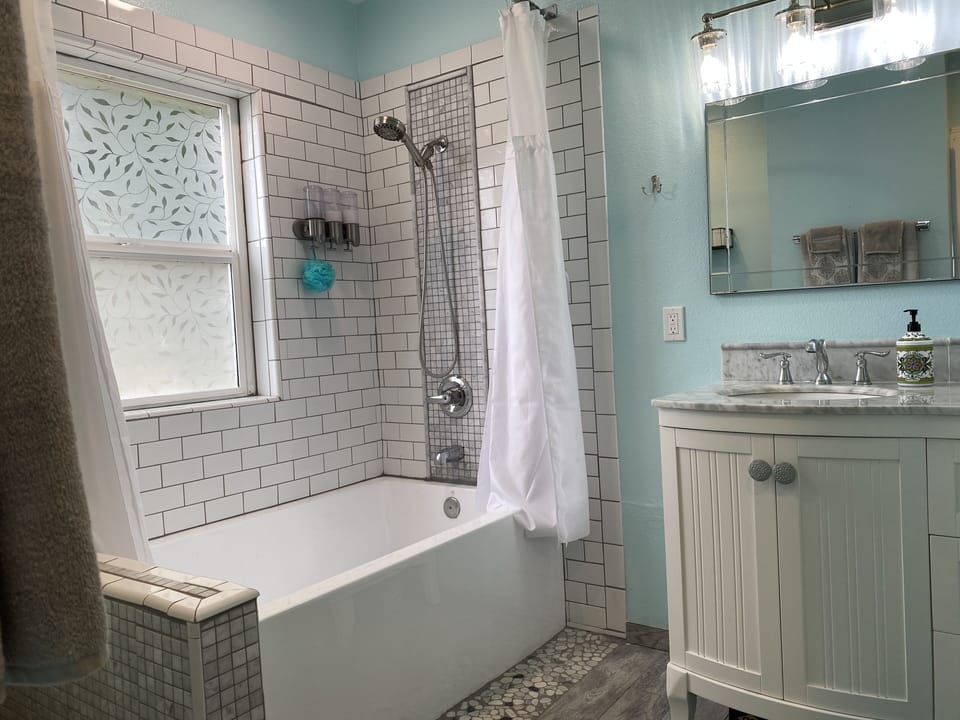 Downstairs bathroom. Note: Decorative tub.  For showers only.