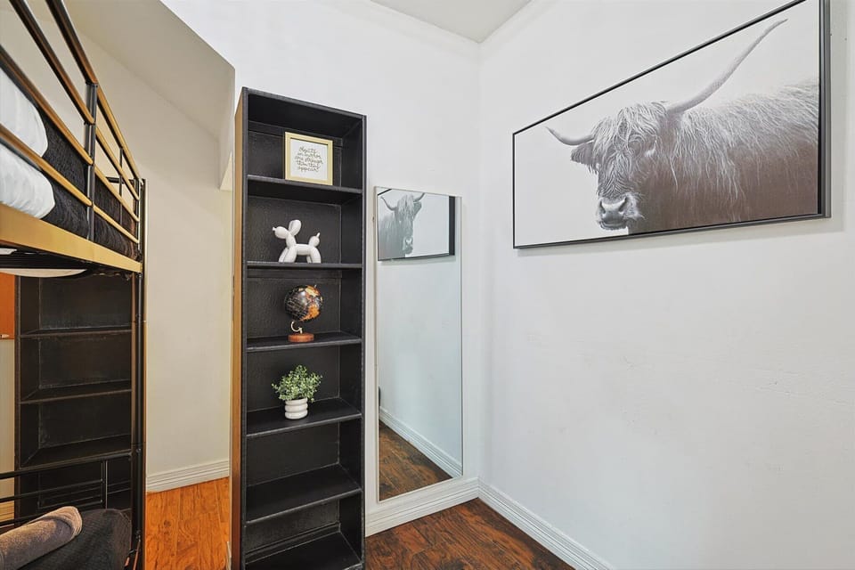 Bunk bedroom connected to the primary room and bathroom