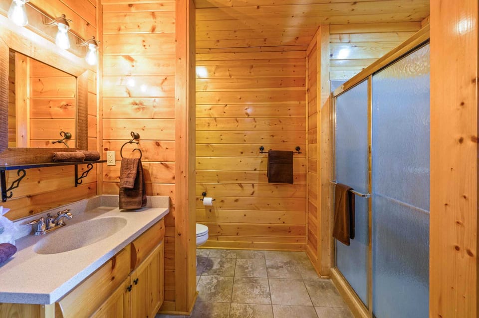 Master bathroom has a shower and jacuzzi tub