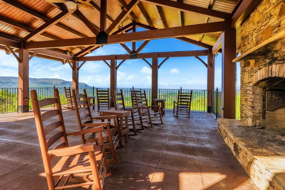 Enjoy a fire while taking in the views & relaxing in a pavillion rocking chair.