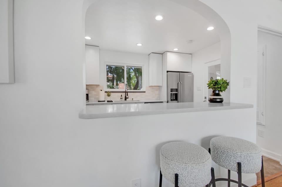 kitchen to dining room pass through with barstools 