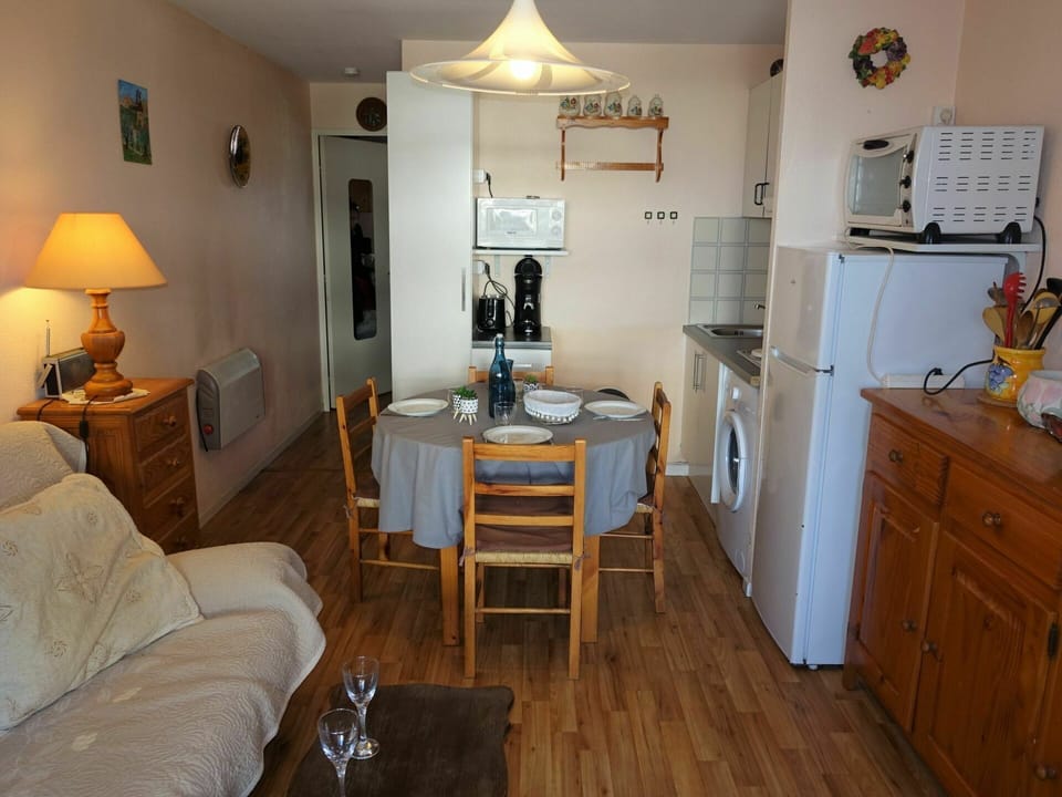 Furniture, Table, Cabinetry, Wood, Lighting, Lamp, Drawer, Floor, Flooring, Chair