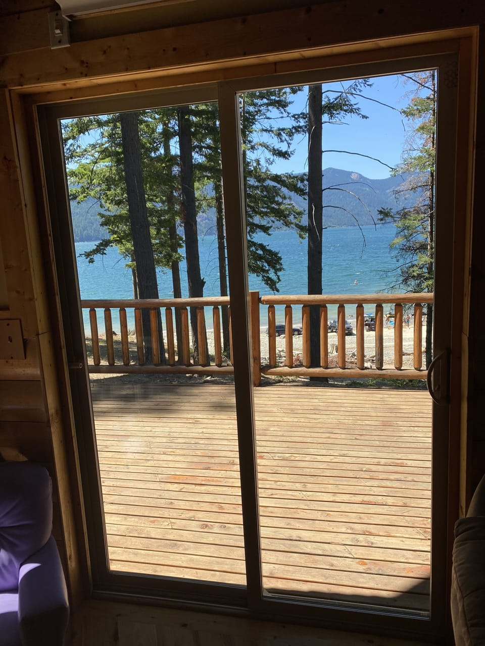 View from the living room looking at the lake. July 2021