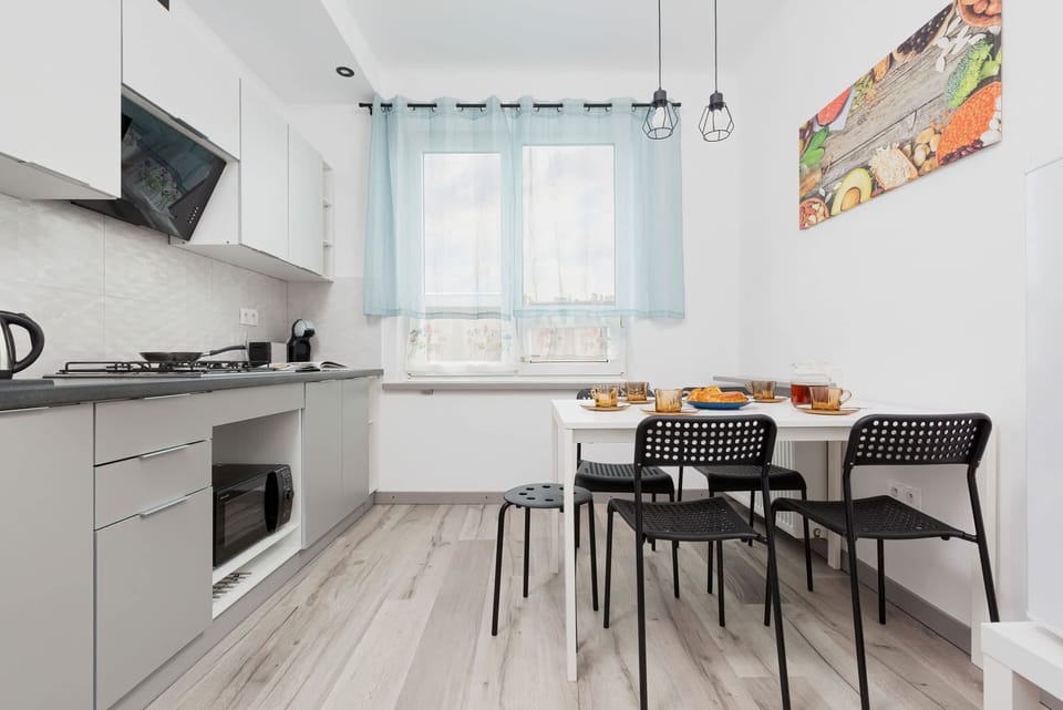 Modern kitchen with eating area.