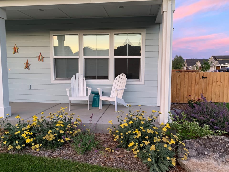 In the front of the house you'll find a small porch with seating for two.