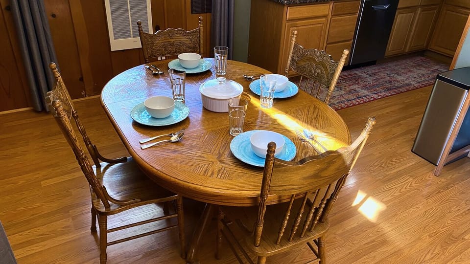 Enjoy your favorite meals on this table set for four.