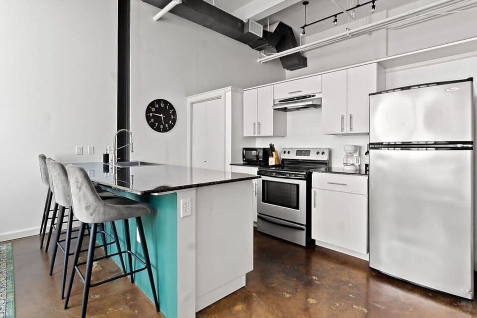 Fully stocked kitchen with modern appliances — perfect for home-cooked meals.