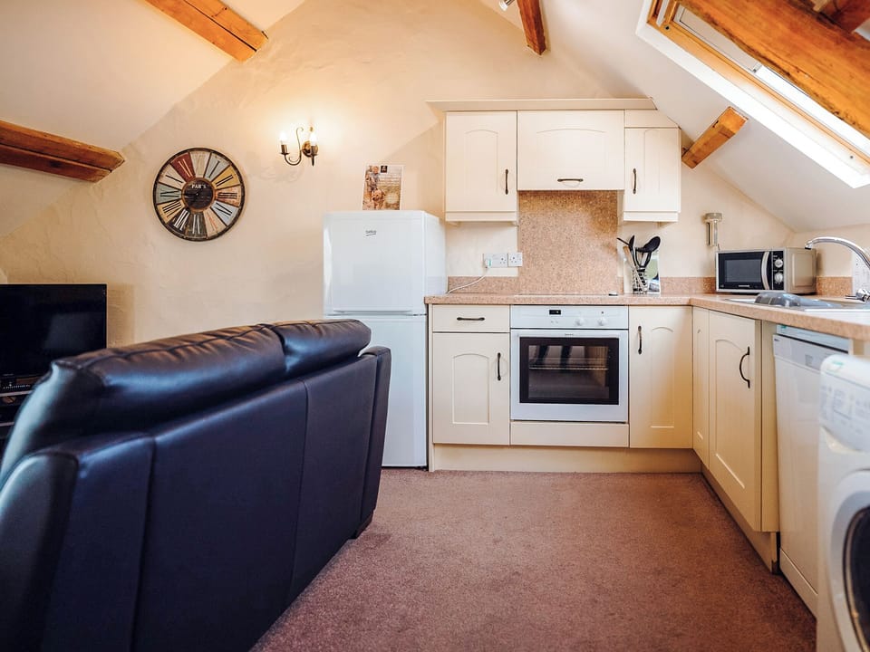 Kitchen area | Seascape Cottage - Celtic Haven Resort, Lydstep, near Tenby