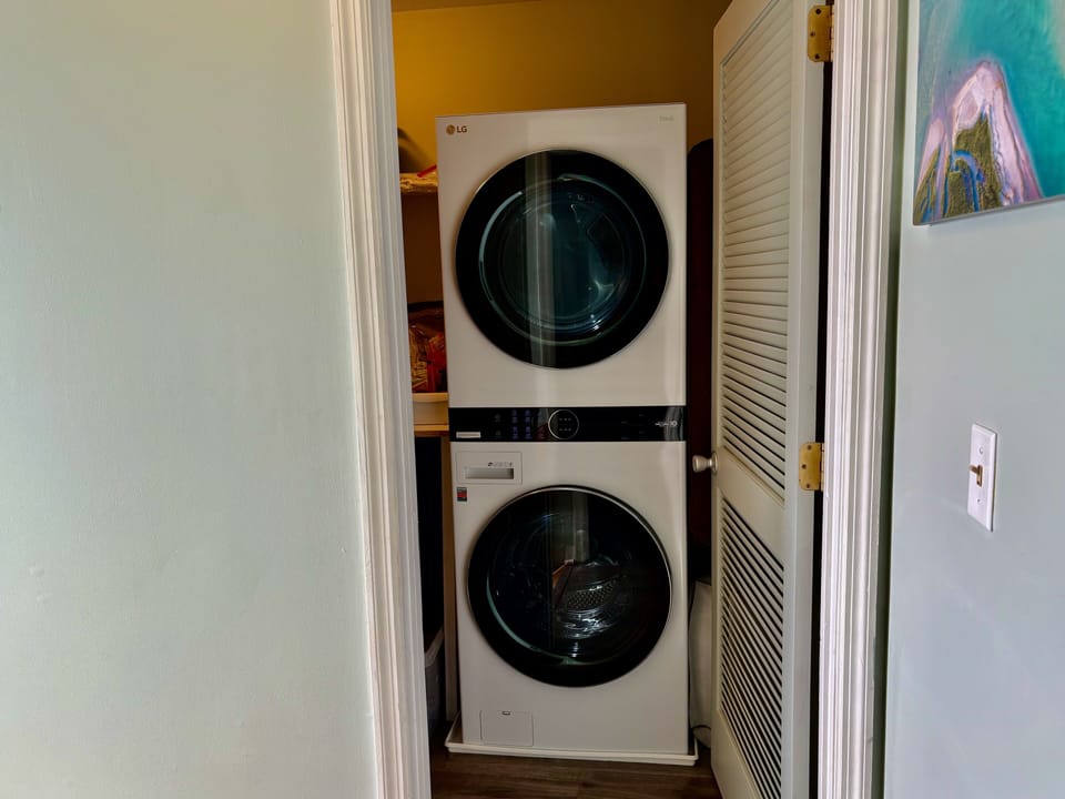 Large capacity LG washer & dryer located across from primary ensuite -level #2