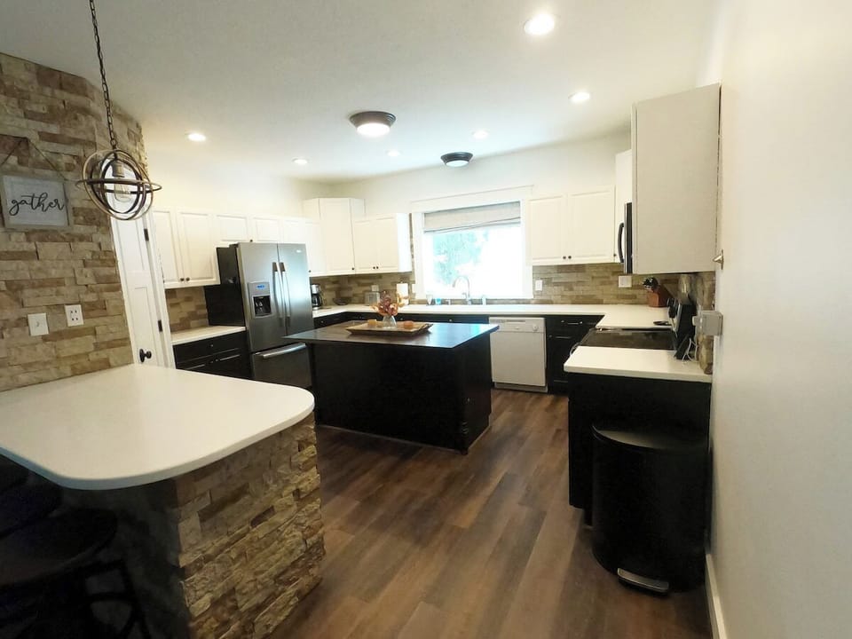 Kitchen with large fridge