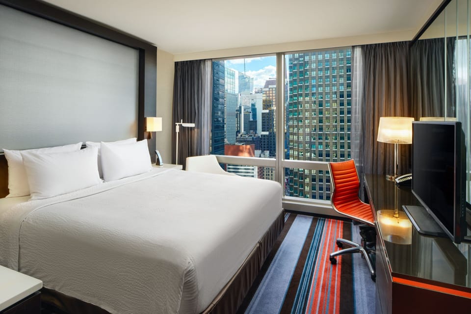 Premium bedding, in-room safe, desk, soundproofing