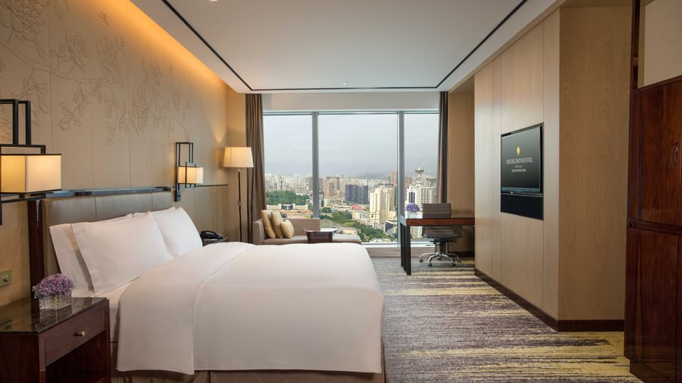 Premium bedding, down comforters, memory foam beds, minibar