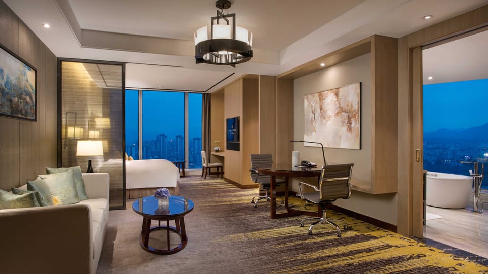 Premium bedding, down comforters, memory foam beds, minibar