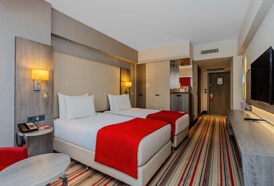 Premium bedding, in-room safe, laptop workspace, free WiFi