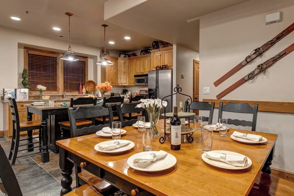 Share meals at your large dining table for eight with ski decor and mountain lodge vibes.