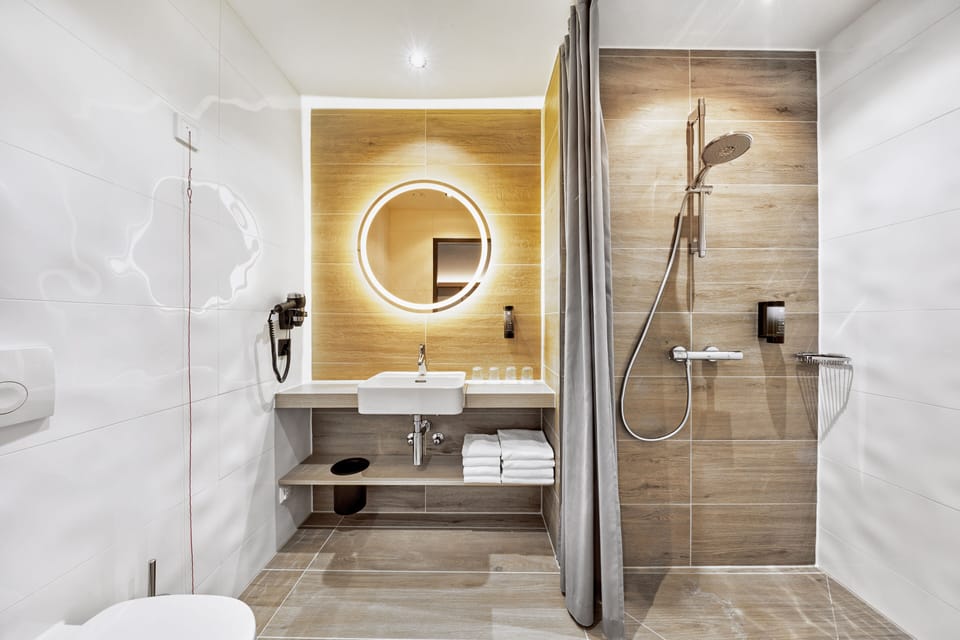 Shower, free toiletries, hair dryer, towels