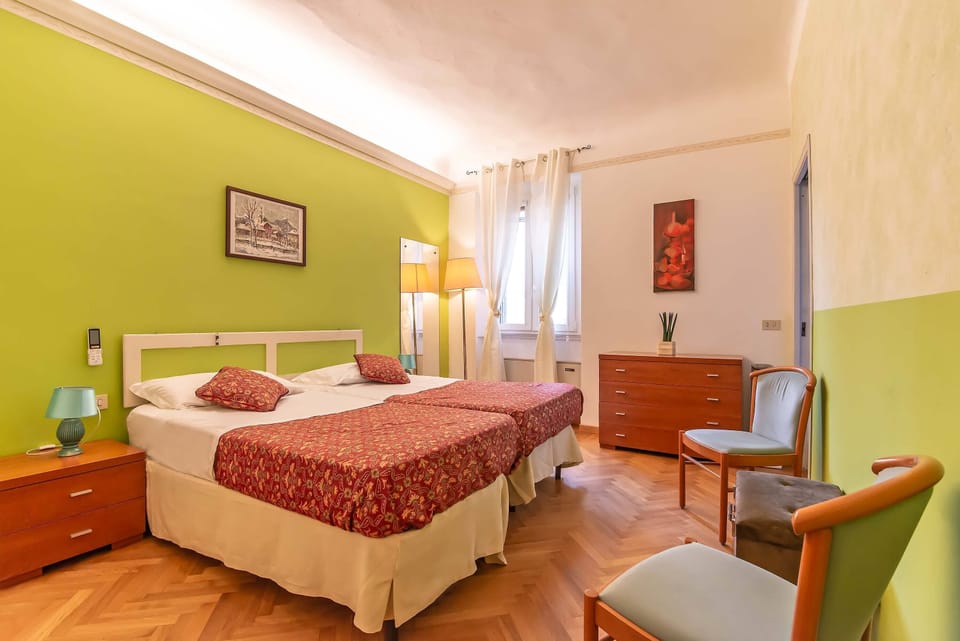 The second bedroom has two twin beds or a king-size one, plus private bathroom. 
