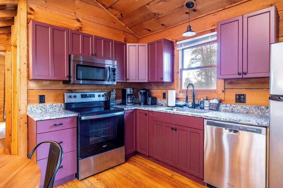 Your kitchen features a fun pop of color and modern appliances.