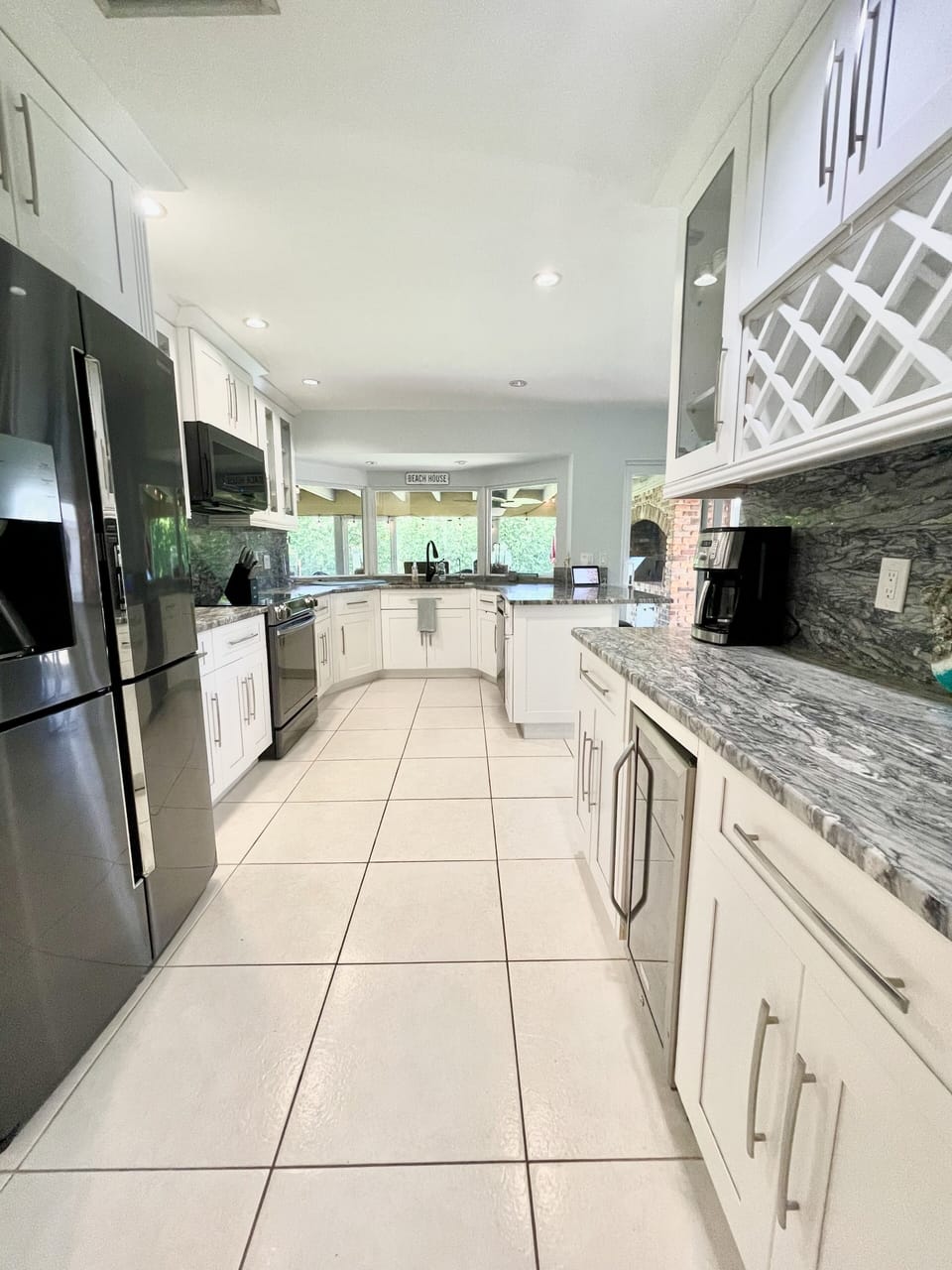 Recently upgraded kitchen with slider to covered patio