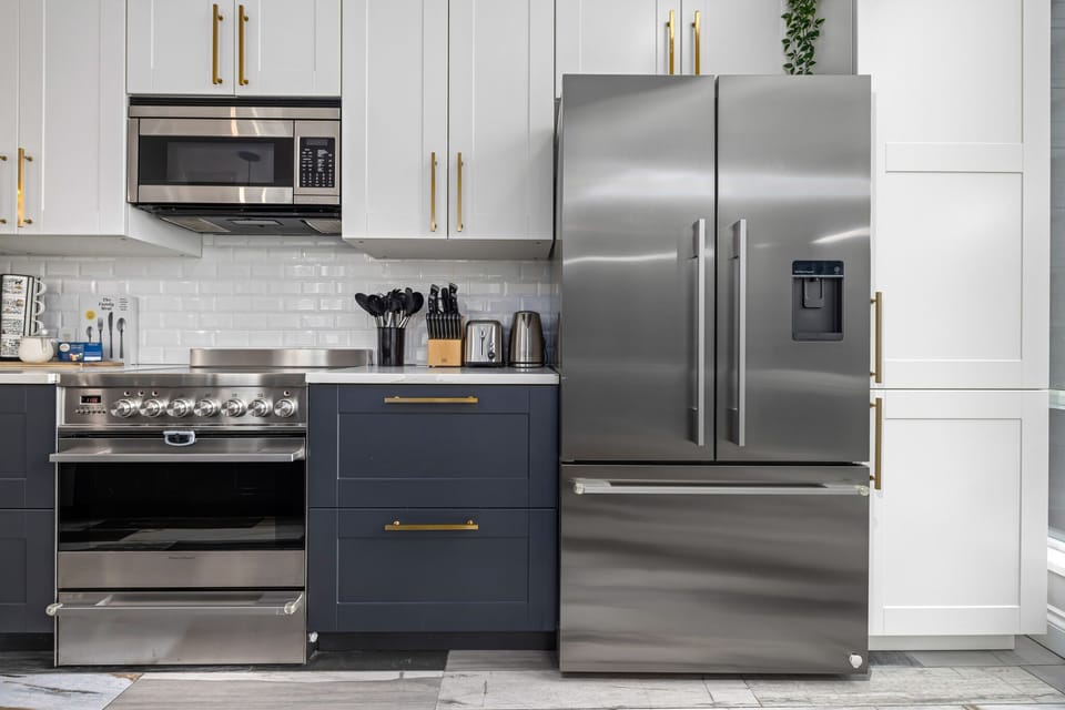 Top-of-the-line, stainless steel appliances and fully stocked with cookware.
