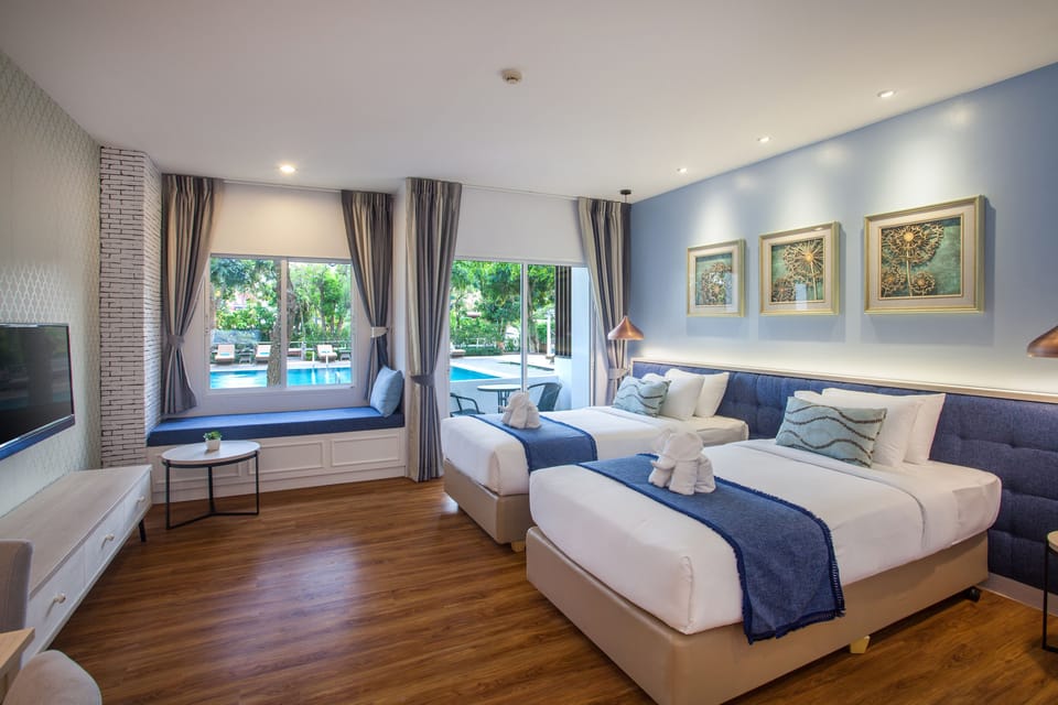 Cabana Room | Down comforters, memory foam beds, in-room safe, desk