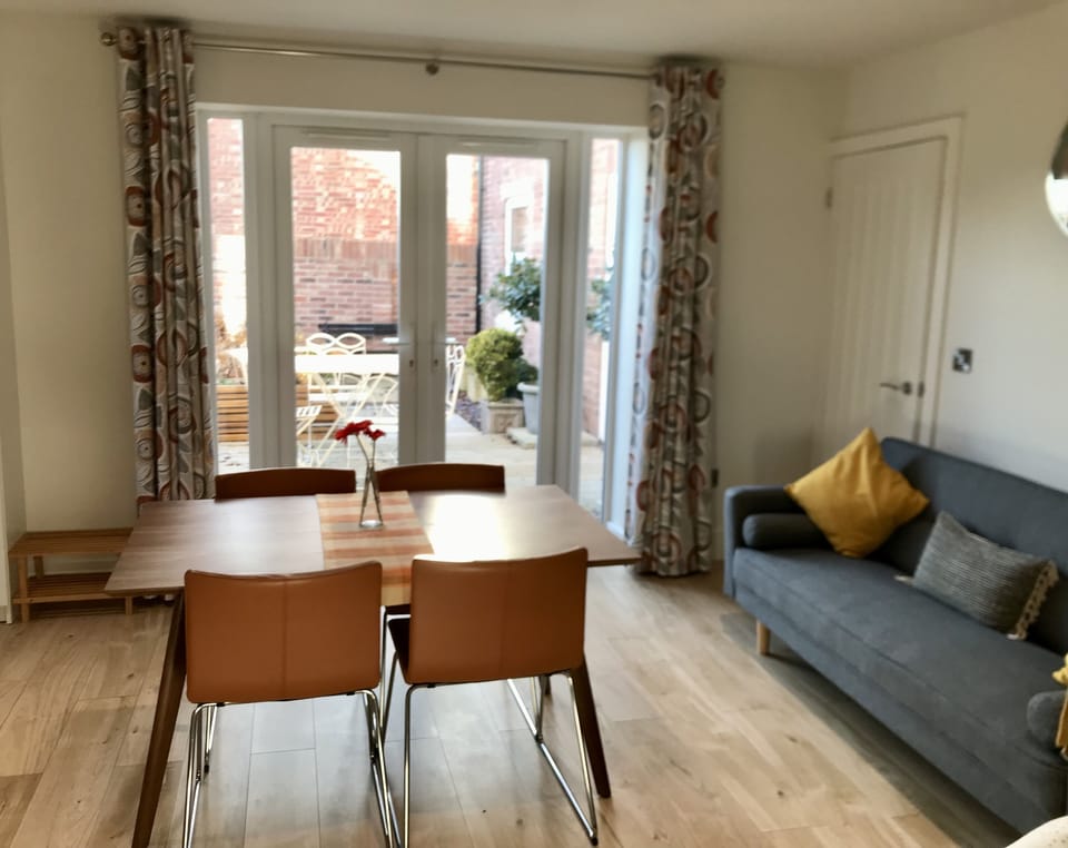 Dine by the open French doors! Or outside on the decking!