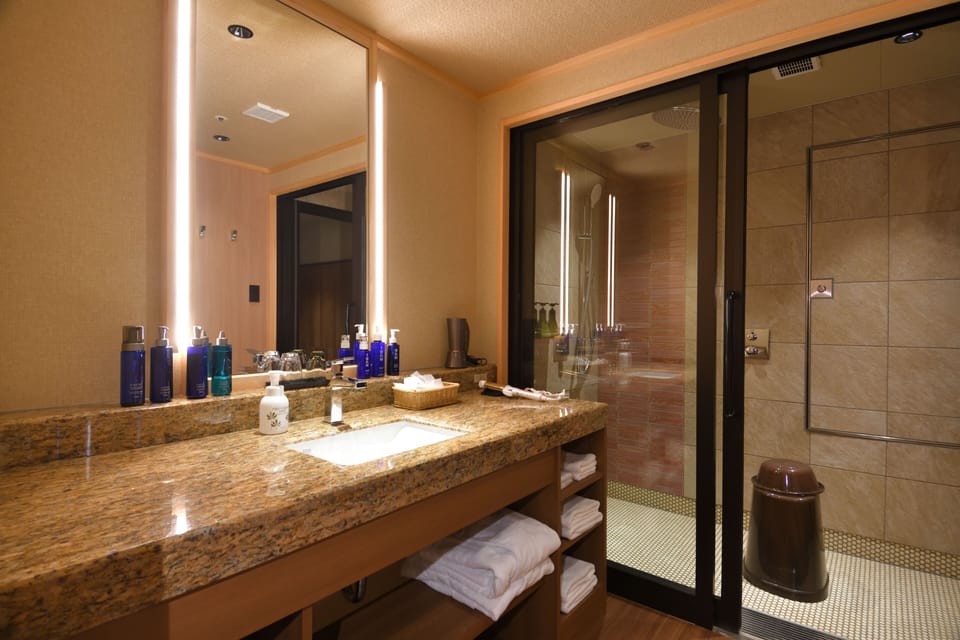 Kotone rooms with open-air hot spring baths Private Suite, Non Smoking | Bathroom | Free toiletries, hair dryer, slippers, electronic bidet