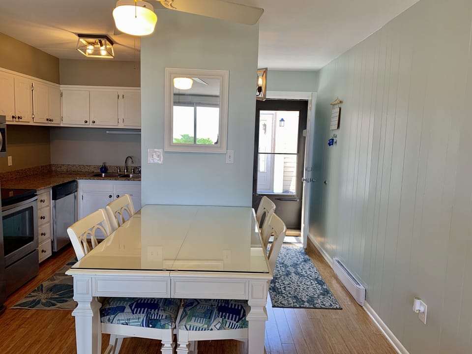 Eating area
3 more foldable chairs under the beds 
The condo is 720 sqft