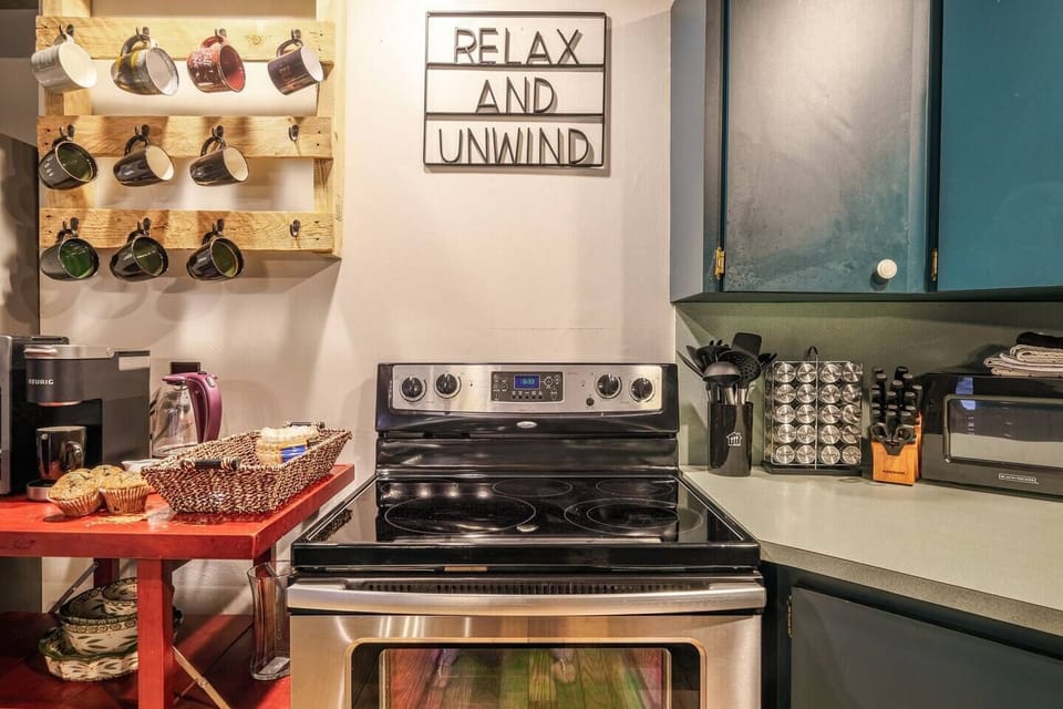 Fully stocked kitchen, spice rack holds a variety of spices for those looking to cook at home