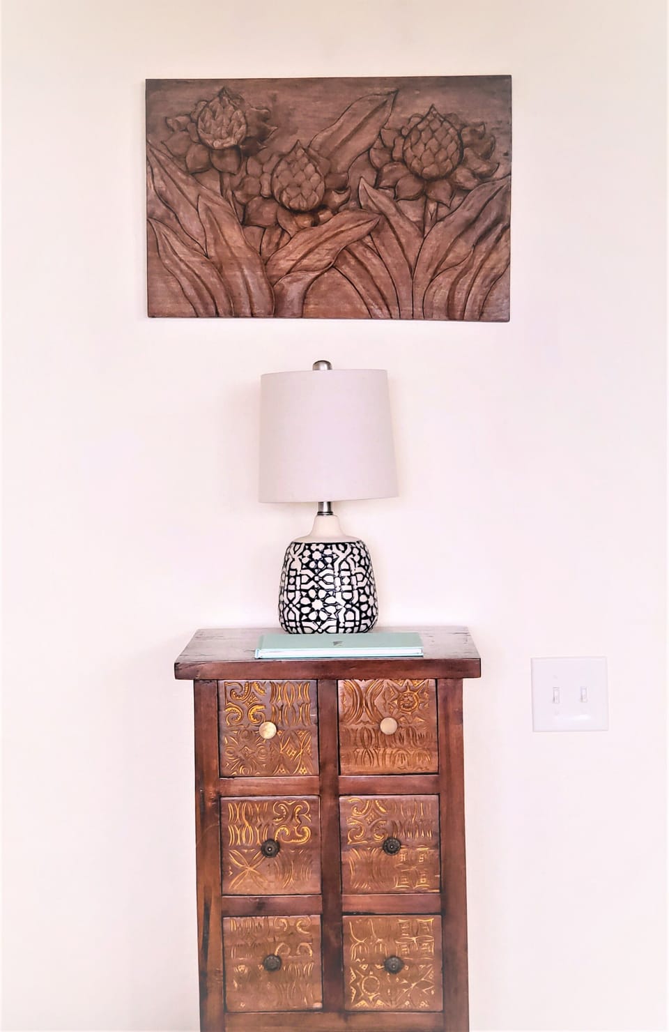 Local furnishings and artwork are found throughout the condo.