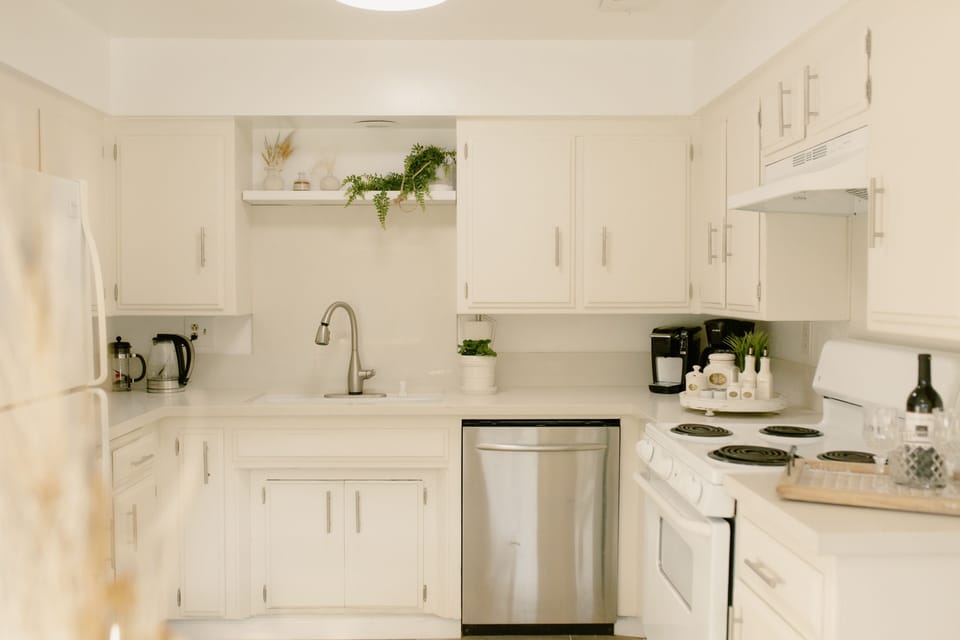 Full kitchen stocked with all the supplies you need to cook and make meals.