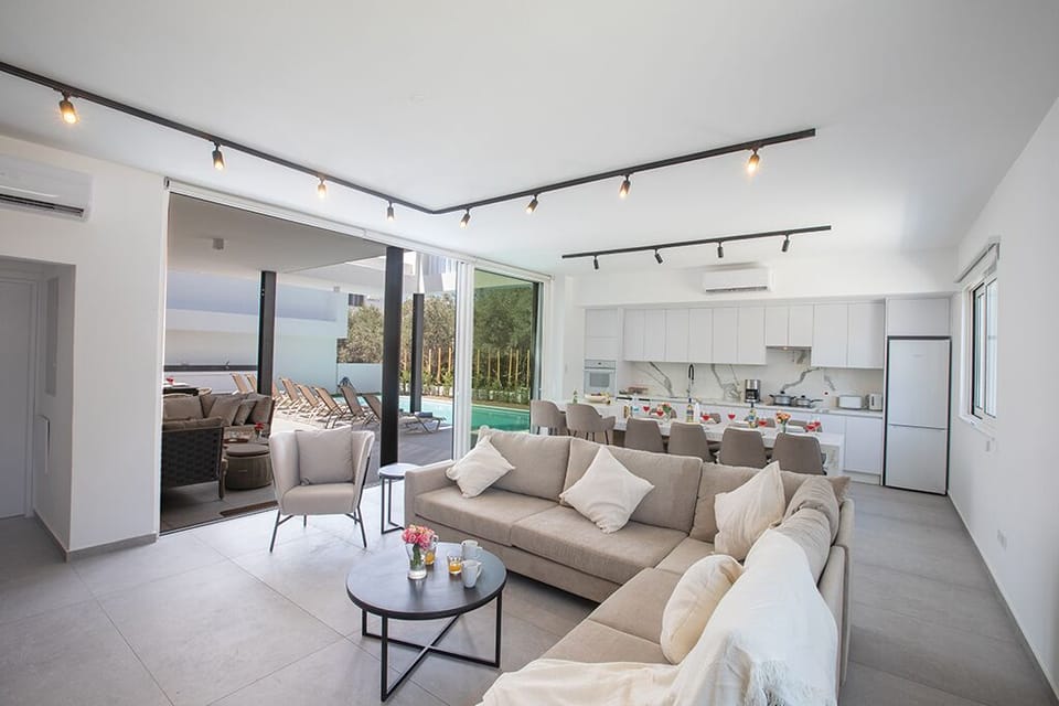 Ground Floor with large patio doors leading to the garden and pool area