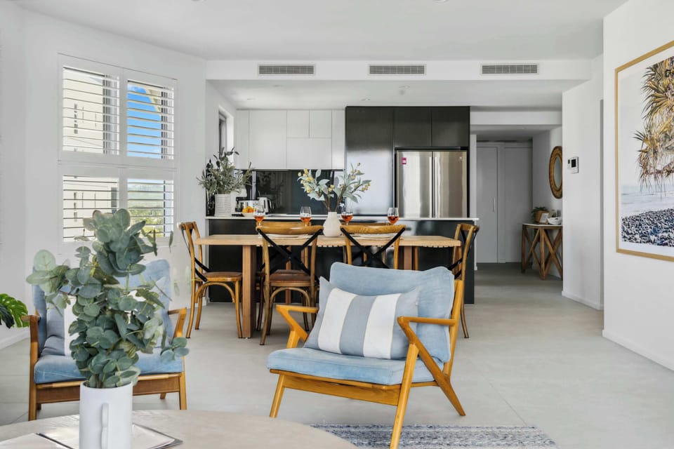 The apartment is styled with lovely furniture throughout.
